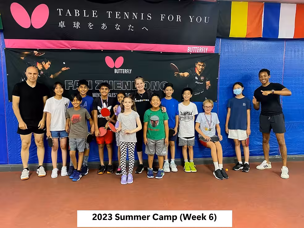 Table tennis lesson in progress